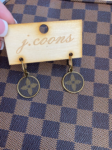 flower logo earrings